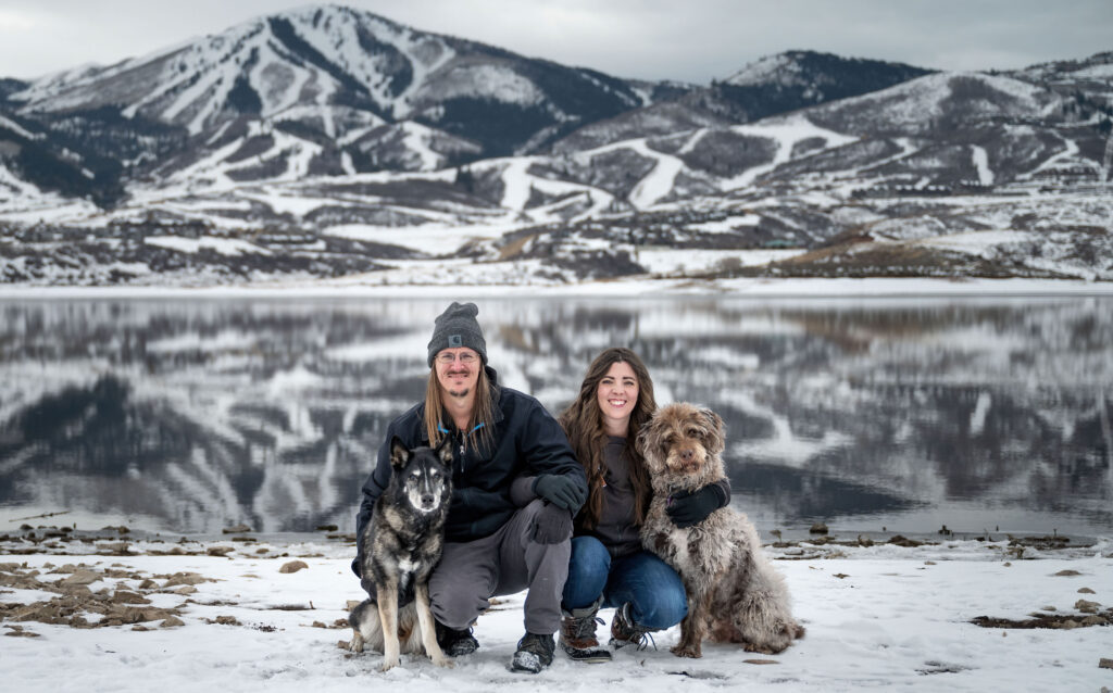 Outdoor dog and family photography session in winter at Jordanelle Reservoir near Park City, Utah